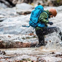 An athlete crosses a 25m wide river